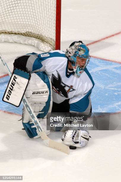 Evgeni Nabokov of the San Jose Sharks makes a save during a NHL hockey game against the Washington Capitals at MCI Center on November 23, 2003 in...