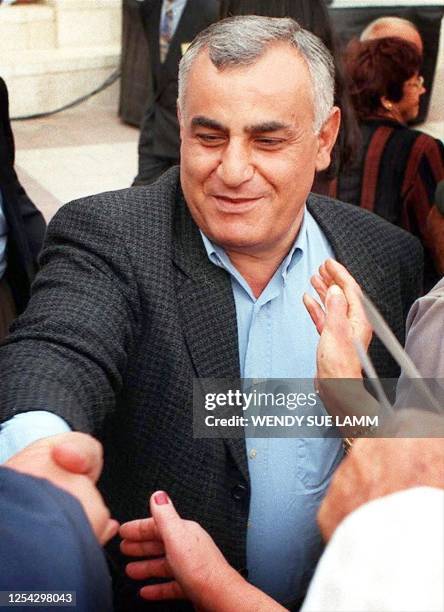 Picture dated 29 April 1997 of Israeli Defense Minister Yitzhak Mordechai getting a warm welcome during the Mimouna celebration in Jerusalem. Israeli...