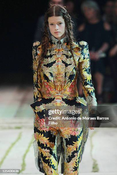 Model walks the runway during the Alexander McQueen Ready to Wear Spring/Summer 2011 show during Paris Fashion Week at on October 5, 2010 in Paris,...