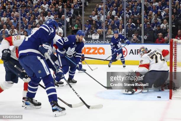 Toronto Maple Leafs center Ryan O'Reilly's deflection of a Mitchell Marner pass beats Florida Panthers goaltender Sergei Bobrovsky but goes wide in...