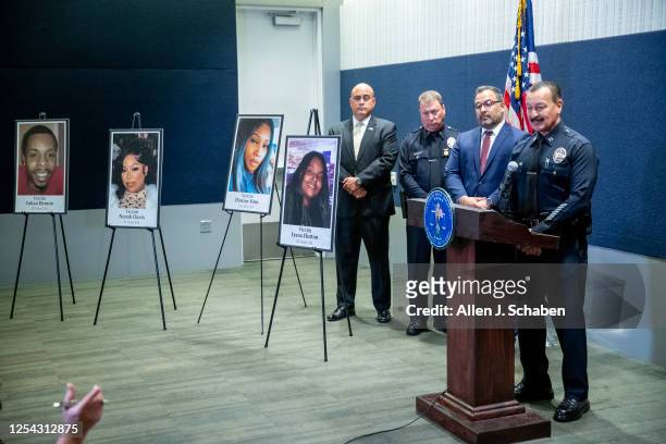 Los Angeles, CA Capt. Jonathan Tippet, who leads the Los Angeles Police Dept. Robbery-Homicide Division, answers questions during a press conference...