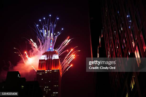 Fireworks are launched from the Empire State Building as part of the annual Macy's 4th of July Fireworks on July 4, 2020 in New York City. This is...