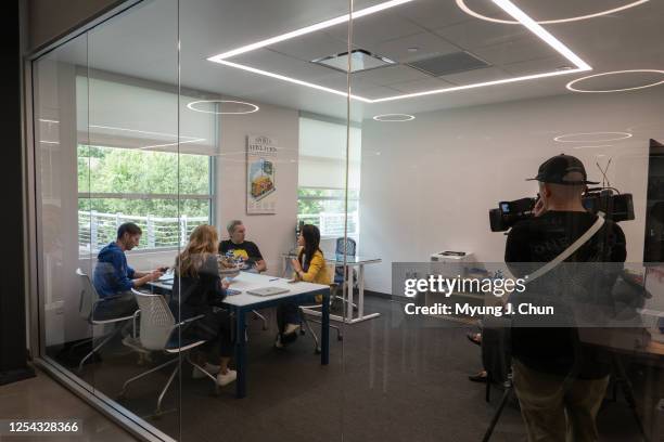 Los Angeles Rams business executives Dan August, left, Executive Vice President of Consumer Revenue and Strategy; Marissa Daly, Vice President and...