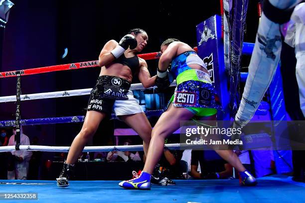 Jackie 'Princesa' Nava punches Estrella 'Chacala' Valverde during an unofficial fight at TV Azteca as part of Volvemos con Punch TV show on July 4,...