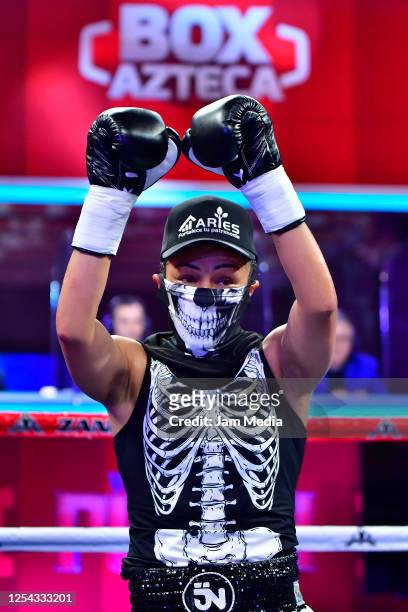 Jackie 'Princesa' Nava celebrates defeating Estrella 'Chacala' Valverde during an unofficial fight at TV Azteca as part of Volvemos con Punch TV show...