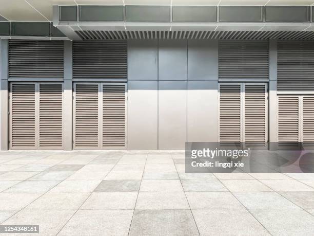 facade of a building in a business district by the west lake in hangzhou, china - west front stock pictures, royalty-free photos & images