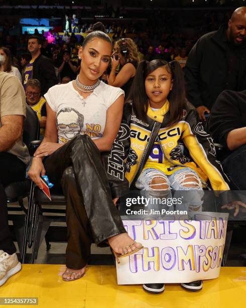 Kim Kardashian and North West poses for a photo in Game Six of the Western Conference Semi-Finals of the 2023 NBA Playoffs between Golden State...