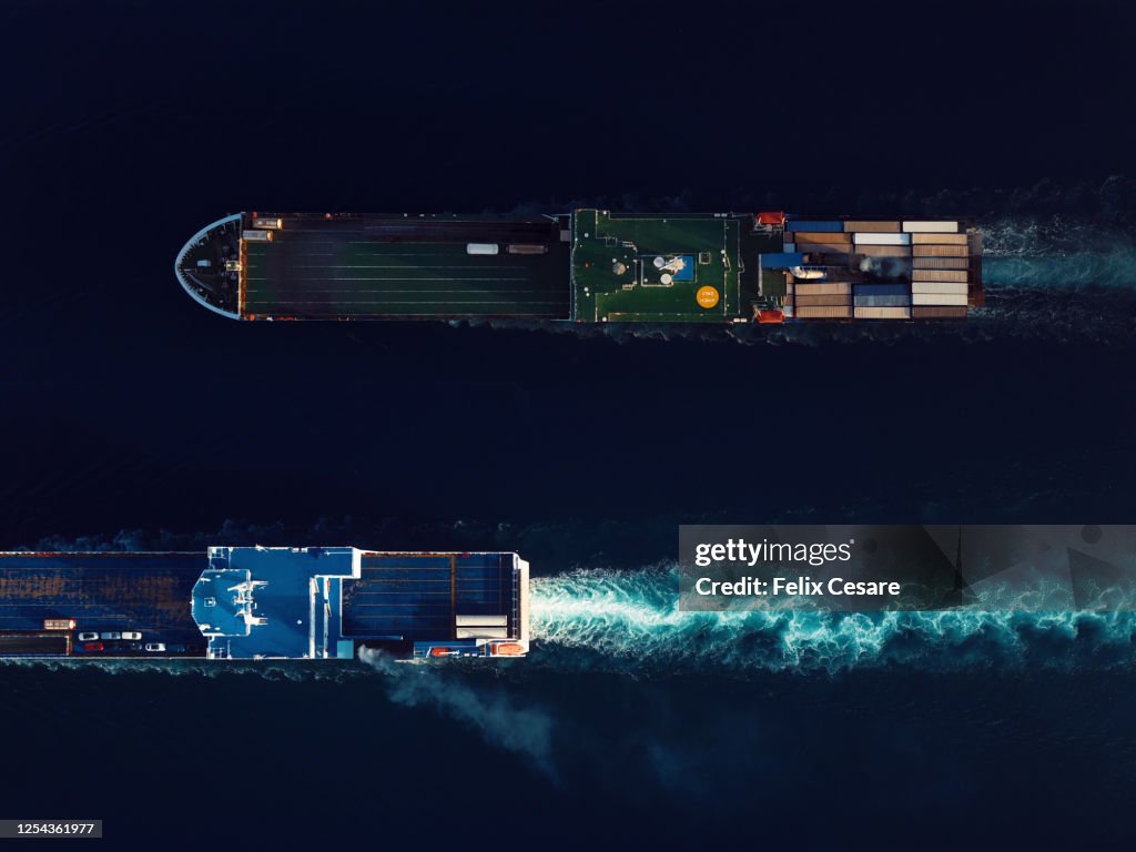 Aerial view of Roll-On/Roll-Off (RoRo) ships at sea. World at work drone view.