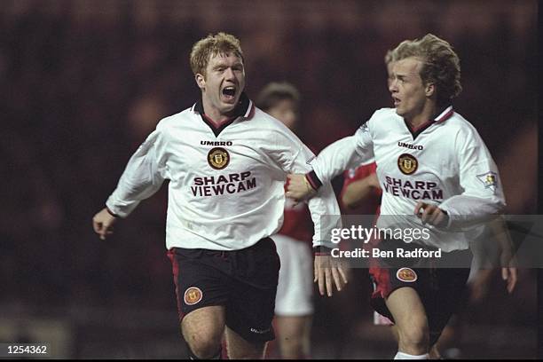 Paul Scholes of Man Utd celebrates with teammate Jordi Cruyff during the FA Carling Premier league match between Middlesbrough and Manchester United...