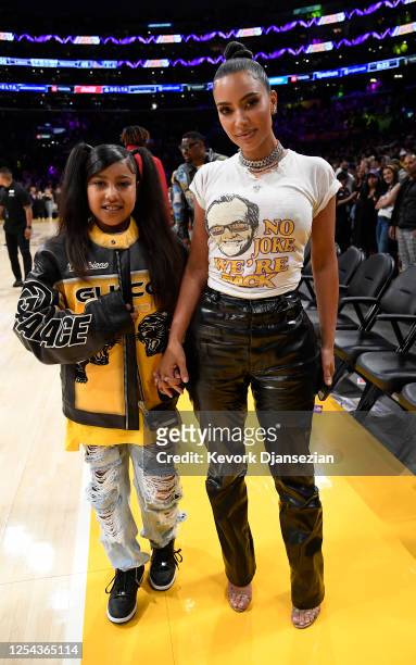 Kim Kardashian and daughter North West attend the the Western Conference Semifinal Playoff game between the Los Angeles Lakers and Golden State...