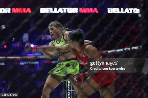 Denise Kielholtz punches Paula Cristina in their women's flyweight fight during the Bellator 296 event at Accor Arena on May 12, 2023 in Paris,...