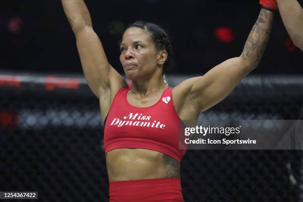 Denise Kielholtz celebrates her victory over Paula Cristina in their women's flyweight fight during the Bellator 296 event at Accor Arena on May 12,...