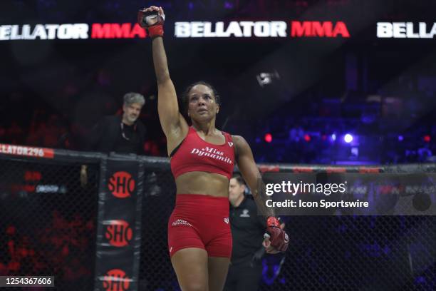 Denise Kielholtz celebrates her victory over Paula Cristina in their women's flyweight fight during the Bellator 296 event at Accor Arena on May 12,...