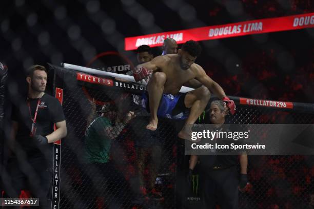 Douglas Lima gets inside the cage for his middleweight fight during the Bellator 296 event at Accor Arena on May 12, 2023 in Paris, France.