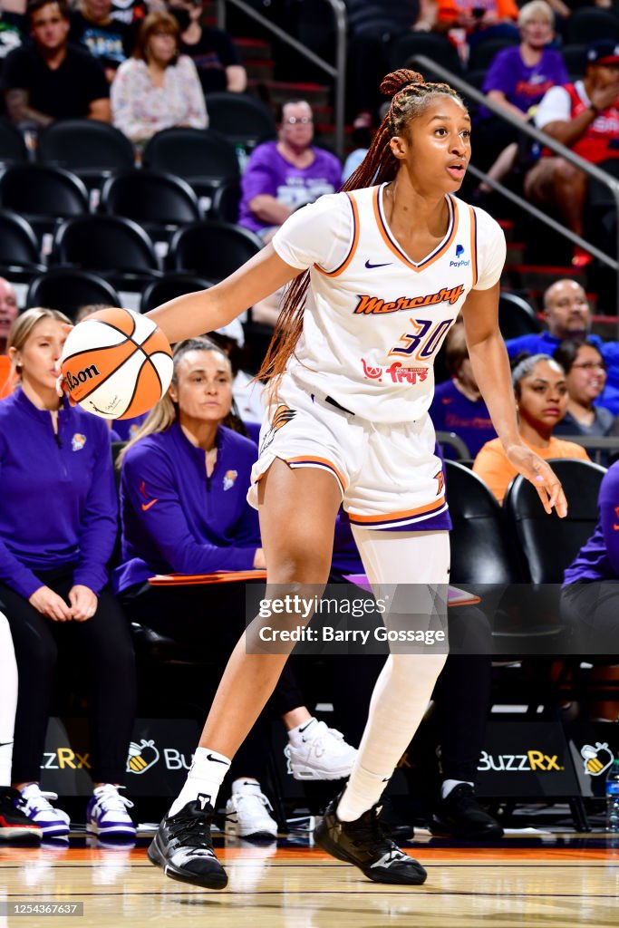 Kadi Rouse Kadi Sissoko of the Phoenix Mercury dribbles the ball against the Los ...