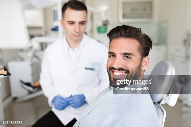 dental check-up procedure - dentists chair stock pictures, royalty-free photos & images