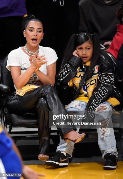 Kim Kardashian and daughter North West attend the Western Conference Semifinal Playoff game between the Los Angeles Lakers and Golden State Warriors...