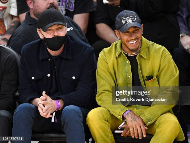 Lewis Hamilton and Leonardo DiCaprio attend the Western Conference Semifinal Playoff game between the Los Angeles Lakers and Golden State Warriors at...