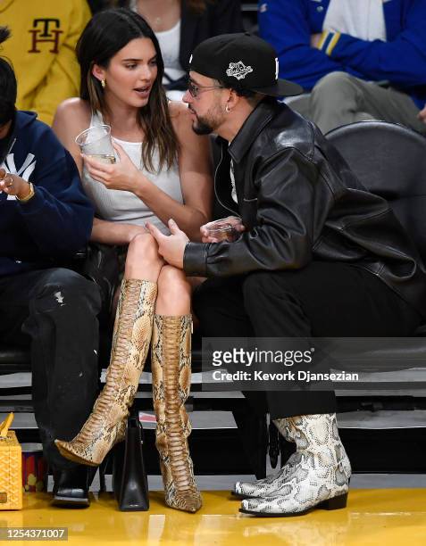 Kendall Jenner and Bad Bunny attend the Western Conference Semifinal Playoff game between the Los Angeles Lakers and Golden State Warriors at...