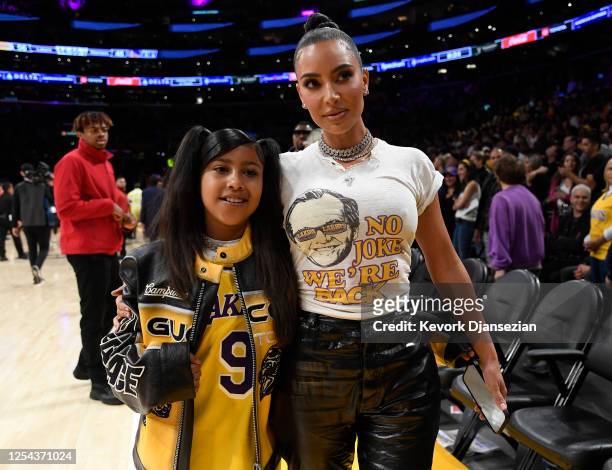 Kim Kardashian and daughter North West attend the Western Conference Semifinal Playoff game between the Los Angeles Lakers and Golden State Warriors...