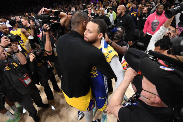 LeBron James of the Los Angeles Lakers and Stephen Curry of the Golden State Warriors after Game Six of the Western Conference Semi-Finals of the...