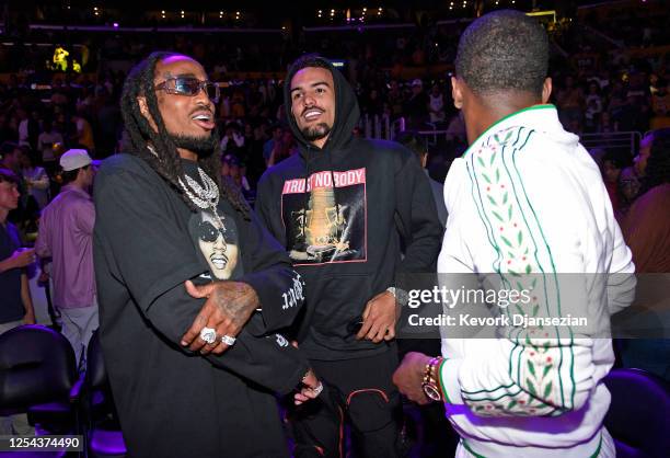 Quavo and Trae Young of the Atlanta Hawks attend the Western Conference Semifinal Playoff game between the Los Angeles Lakers and Golden State...