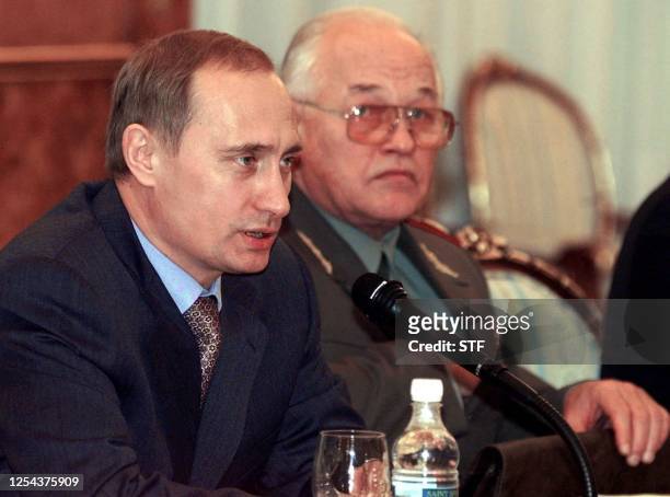 Russian Prime Minister Vladimir Putin speaks as Defence Minister Igor Sergeyev looks on, 25 October 1999, during a meeting in Moscow. Earlier in the...
