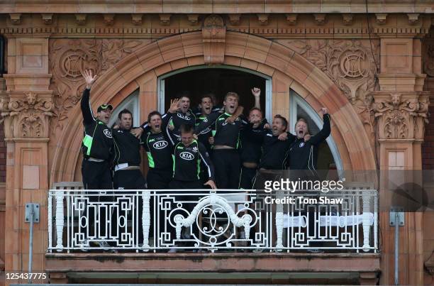 The Surrey team celebrate on the balcony after winning the match during the Clydesdale Bank 40 Final between Surrey and Somerset at Lord's Cricket...