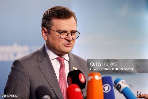 Ukrainian Foreign Minister Dmytro Kuleba talks to journalists after being received by Swedish Foreign Minister for an informal meeting of EU foreign...