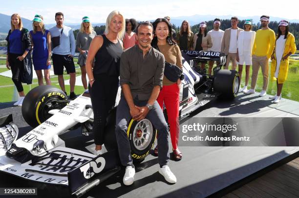 Tanja Guendling, VP AlphaTauri, CEO AlphaTauri Ahmet Mercan and Mik Yong, Head of Design AlphaTauri pose with models during the AlphaTauri Collection...