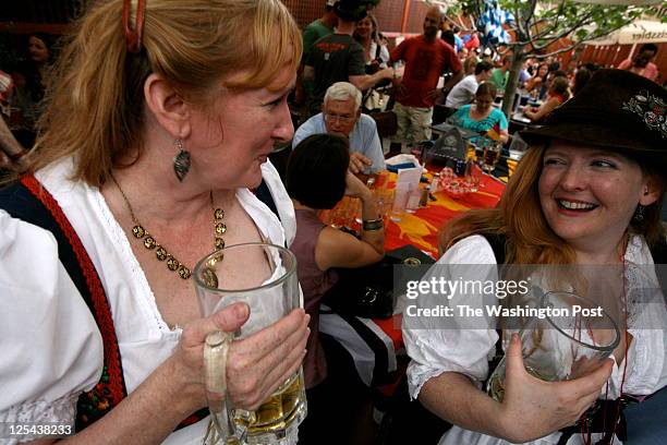 Fd-firstbite1Date: August 14th, 2010Credit: Evy Mages/FTWPLocation: Washington, DC, Biergarten Haus, 1355 H St. NECaption: patrons to the biergarten...