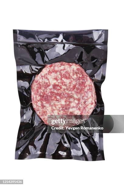 marbled beef steak in vacuum packaging isolated on white background - sotto vuoto foto e immagini stock