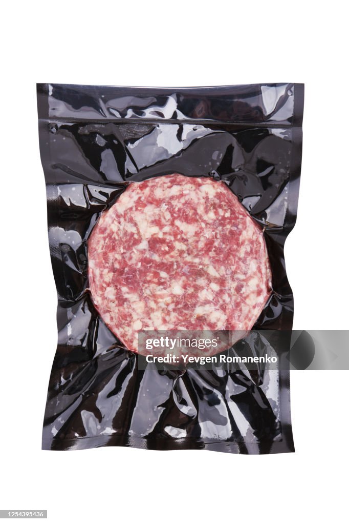 Marbled Beef Steak in vacuum packaging isolated on white background