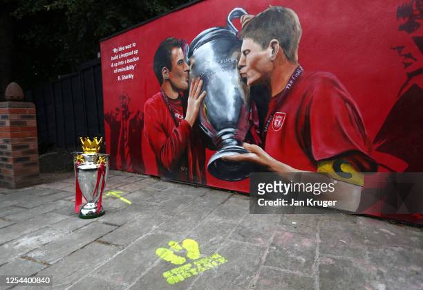 Liverpool mural celebrating a previous UEFA Champions League Trophy win is seen prior to the Premier League match between Liverpool FC and Aston...