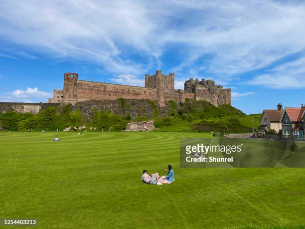 bamburgh castle, england - bamburgh castle stock pictures, royalty-free photos & images