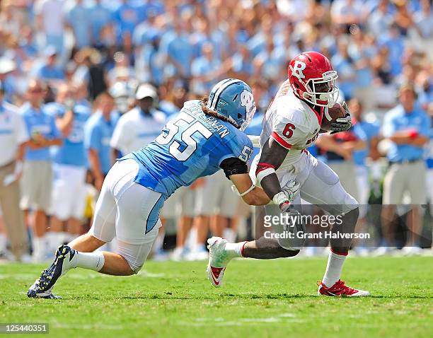 Tommy Heffernan of the North Carolina Tar Heels and Mohamed Sanu of the Rutgers Scarlet Knights at Kenan Stadium on September 10, 2011 in Chapel...