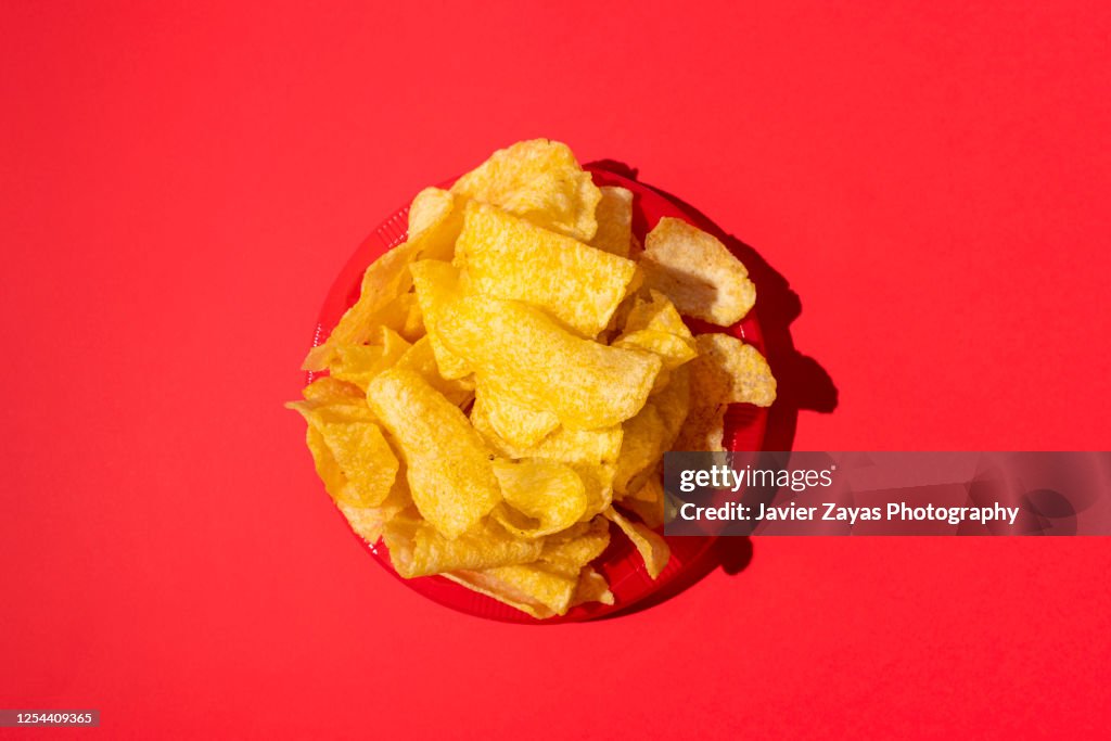 Potato Chips On A Red Plate