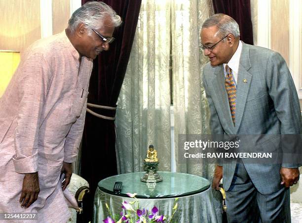 Maldives President Maumoon Abdul Gayoom and Indian Defence Minister George Fernandes take their seats prior to their talks at the presidential palace...