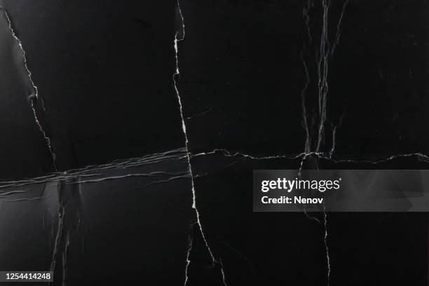 black paper texture background - zerkratzt stock-fotos und bilder