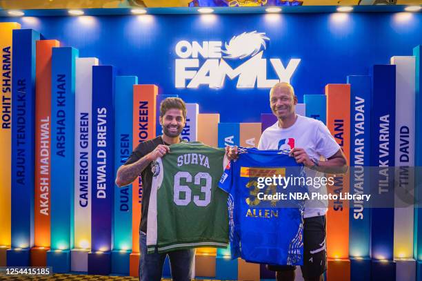 Suryakumar Yadav of Mumbai Indians and NBA Hall of Fame Ray Allen poses for a photograph as they exchange jersey at the team room on May 12, 2023 in...