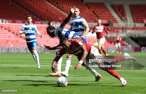 Britt Assombalonga of Middlesbrough claims for a late penalty as he is knocked off the ball by Osman Kakay of Queens Park Rangers during the Sky Bet...