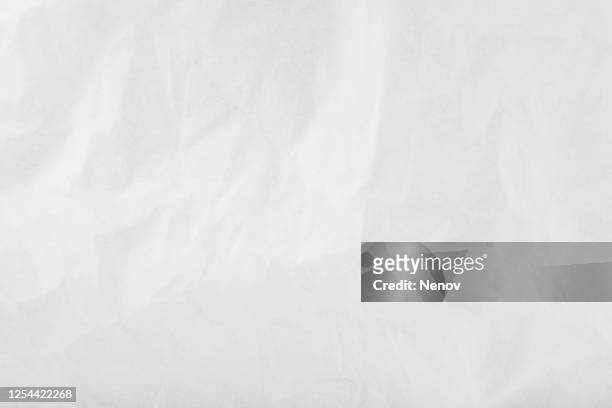 texture of crumpled white paper - crumpled paper stock-fotos und bilder