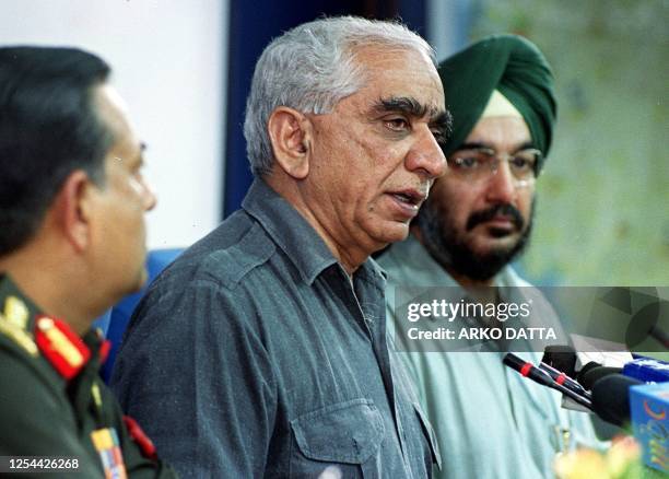Indian Foreign Minister Jaswant Singh briefs the media at a press conference 16 July 2000 on a military strike in Sierra Leone as foreign office...