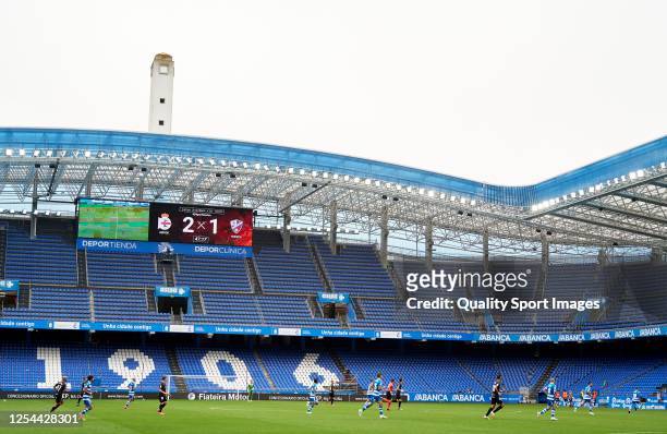 General view shows the empty stands during the La Liga Smartbank match between RC Deportivo and SD Huesca at Riazor Stadium on July 05, 2020 in La...