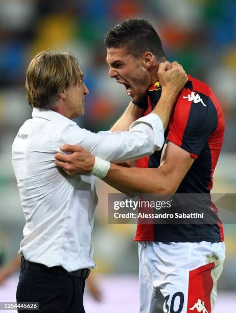 Davide Nicola head coach of Genoa CFC celebrates with Andrea Favalli of Genoa CFC after the Serie A match between Udinese Calcio and Genoa CFC at...