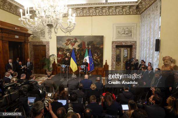 Ukrainian President Volodymyr Zelenskyy and Italian Premier Giorgia Meloni attend a joint press conference following their meeting at Chigi Palace...