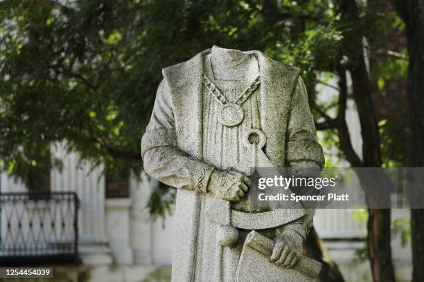 The headless statue of Christopher Columbus stands outside of Waterbury’s city hall on July 05, 2020 in Waterbury, Connecticut. The decapitated...