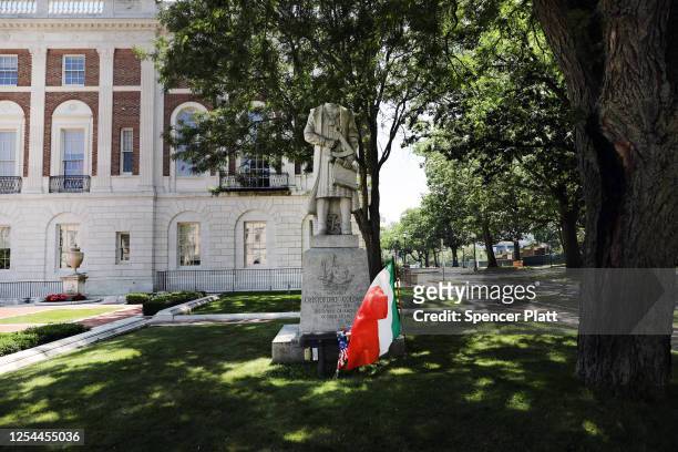 The headless statue of Christopher Columbus stands outside of Waterbury’s city hall on July 05, 2020 in Waterbury, Connecticut. The decapitated...