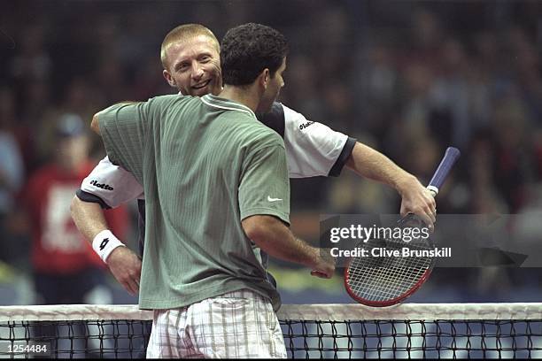 Pete Sampras of the USA is congratualted by Boris Becker of Germany after his five set victory over Becker in the final during the ATP Tour World...