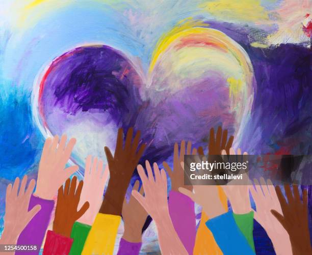 raised hands and heart shape acrylic painting - anti racism stock illustrations